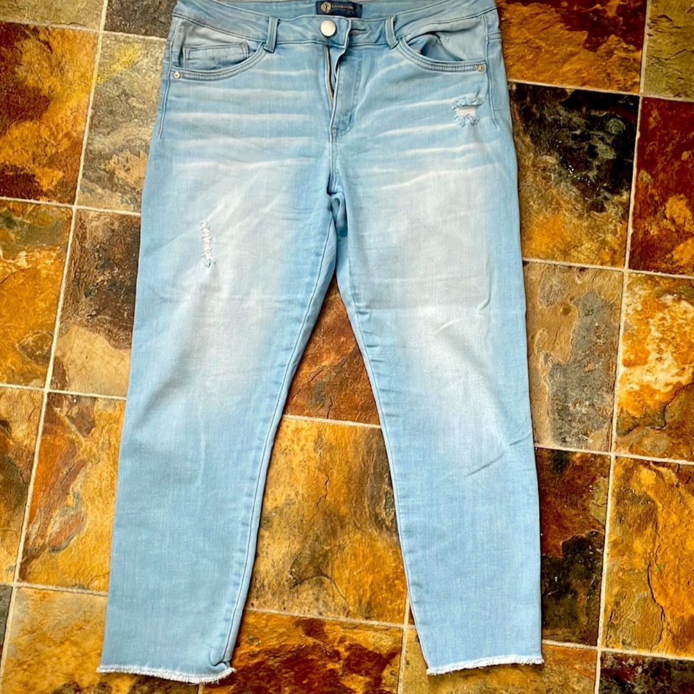 Washed/ discolored vintage high rise ankle jeans